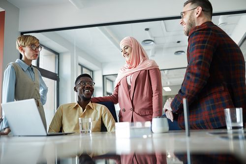 Multi-ethnic-business-team-in-conference-room